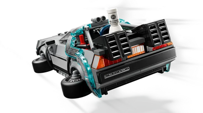 Time machine toy vehicle, teal frame and orange lights, angled side view