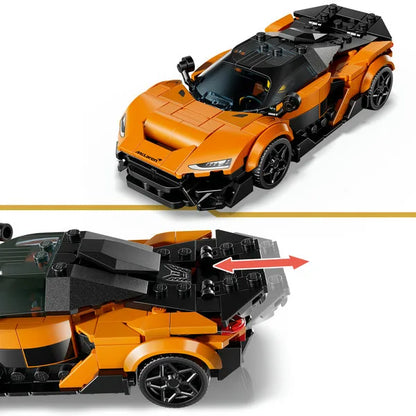 McLaren W1 toy sports car in orange with black aerodynamic parts and cockpit detail.