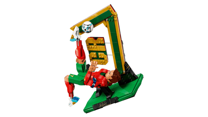LEGO soccer legend figure with red jersey, green pants, and white boots on green base