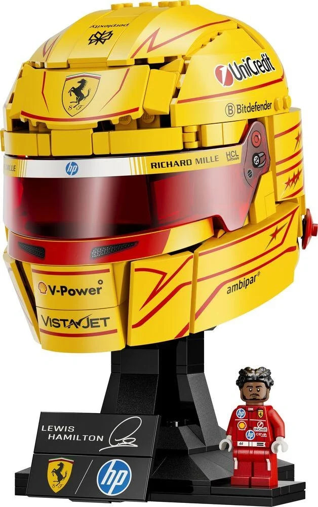 Yellow racing helmet toy with red visor and minifigure on black stand