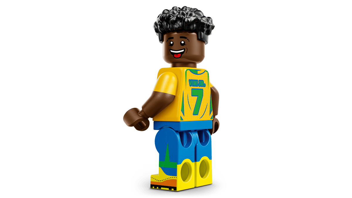 LEGO soccer minifigure with black curly hair, yellow jersey with 7, smiling face