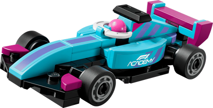 Mini F1 Academy car with teal body, pink nose, black wheels and rear wing