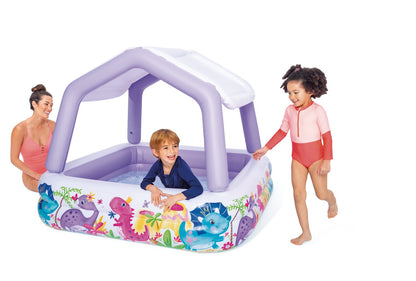 Inflatable kids pool with sun canopy and cartoon ocean-animal graphic, purple tubes