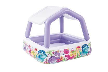 Inflatable kids pool with purple frame and white sun canopy, colorful dinosaur print