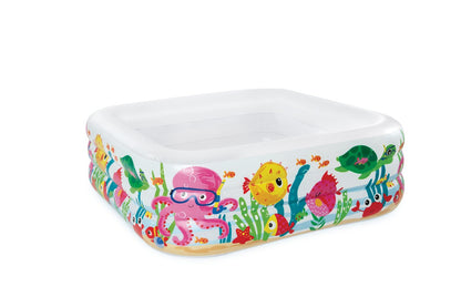 Inflatable pool with white rim and colorful sea animal print all around the edge