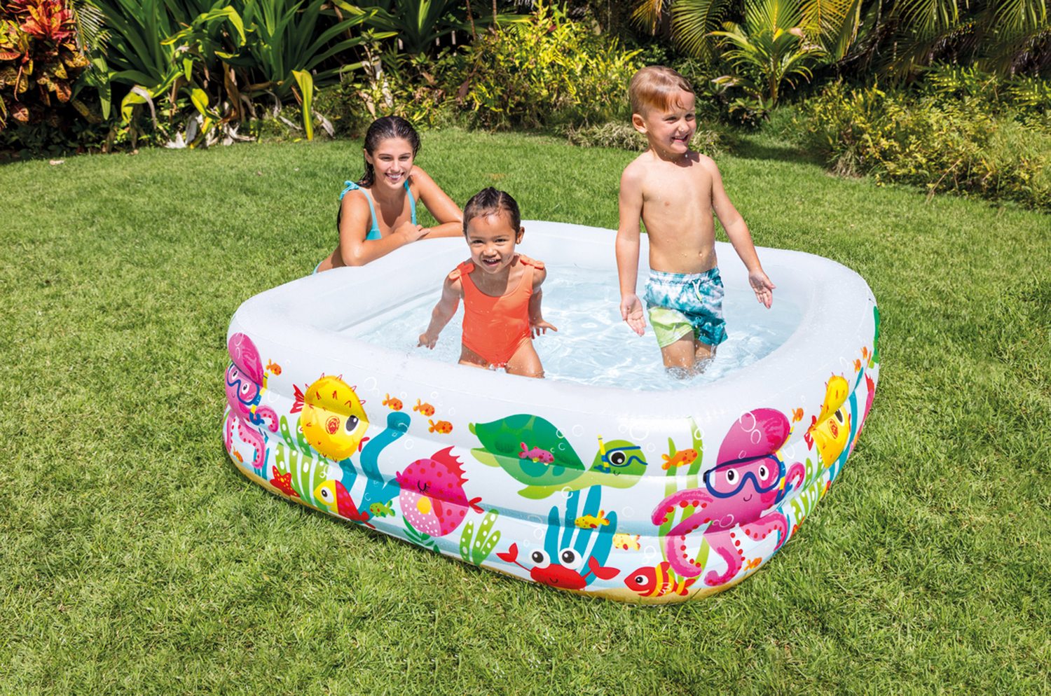 Inflatable sea animal pool with kids splashing inside
