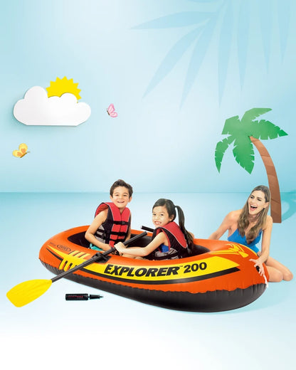 Orange inflatable boat with yellow graphics and two yellow paddles