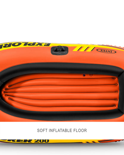 Soft inflatable floor with orange panels and black edging, including a small valve