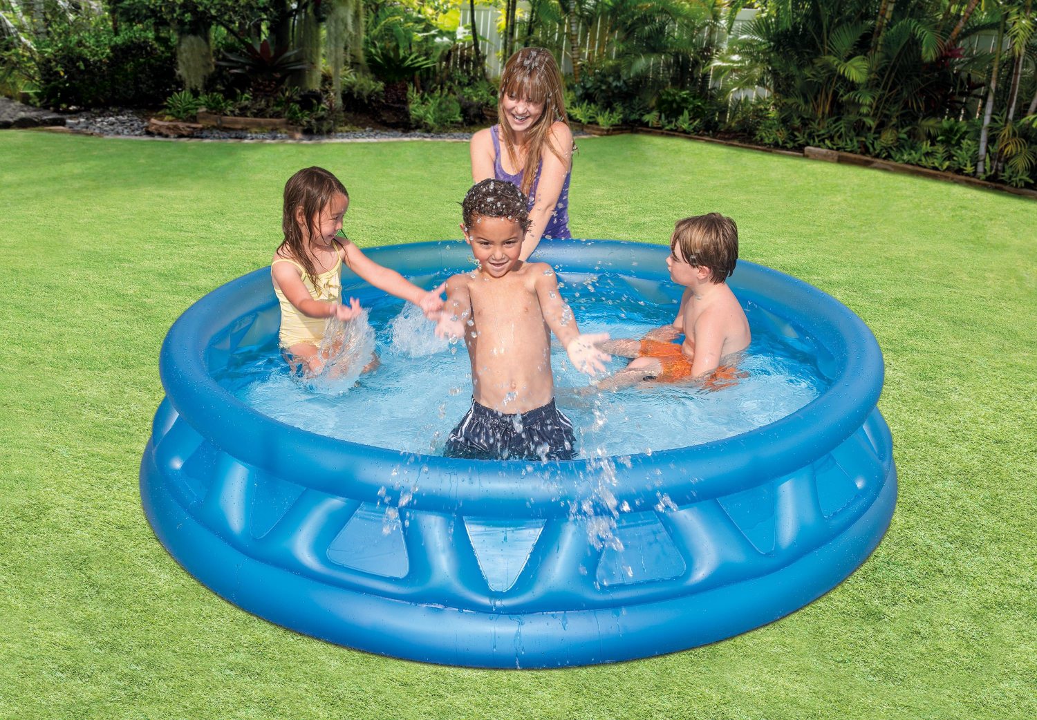 Blue inflatable pool with wide round rim, outdoors in a backyard