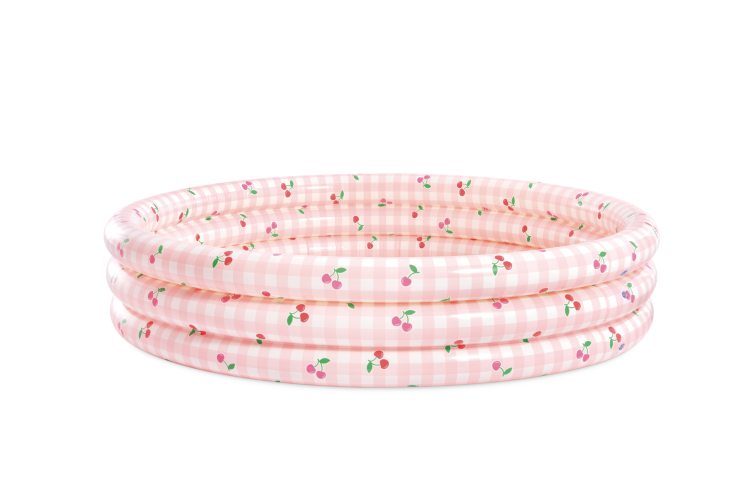 Inflatable kiddie pool with pink gingham and cherry print, side view