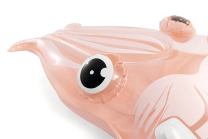 Cuttlefish float pool toy in light pink with large black-and-white eye close-up