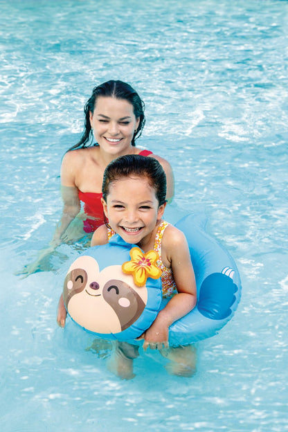 Blue animal inflatable swim ring with bear face, used in pool by child