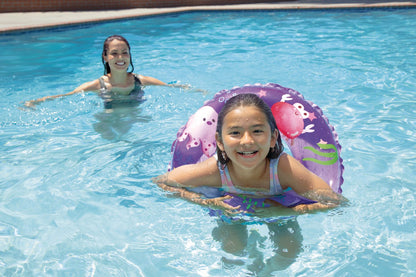 Purple inflatable pool ring in use by child in the water, clear center