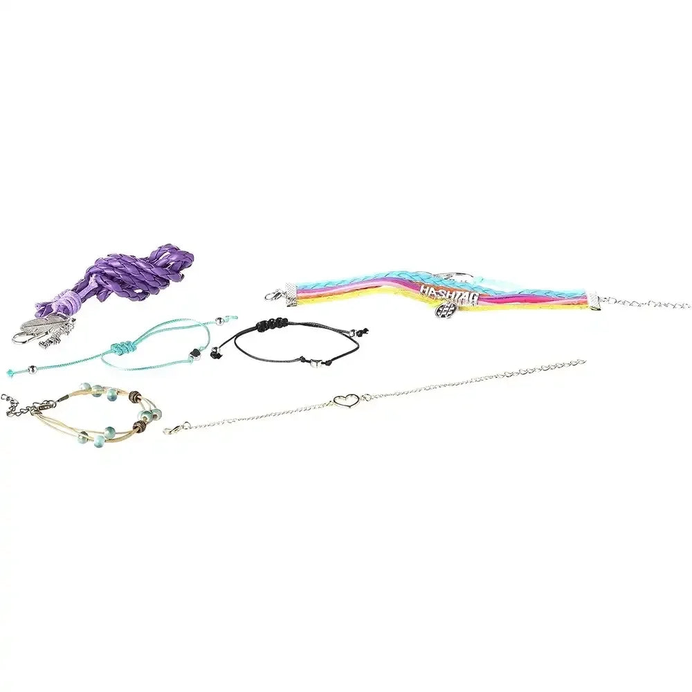 Multi-bracelet set with beaded, charm, chain and cord bracelets in purple, blue and green