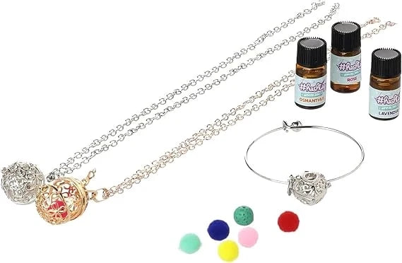 Aroma jewelry set with silver chain necklace, charm bracelet, and mini scent bottles