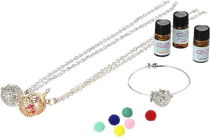 Aroma jewelry set with silver chain necklace, charm bracelet, and mini scent bottles