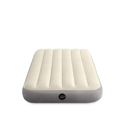 Twin airbed with cream top and gray base, centered circular valve