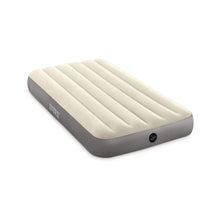 Intex twin airbed with cream top and gray sides, circular valve on the side