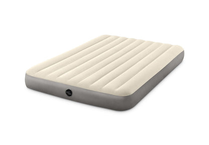 Single-high airbed, cream top with vertical channels, dark gray base and round valve