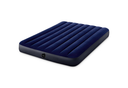 Dark blue inflatable airbed with raised ribbed surface and rounded corners