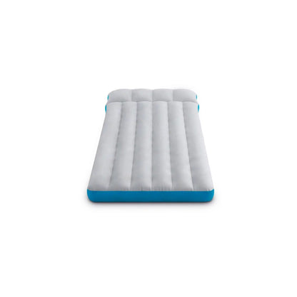 Gray camping mat with blue trim, raised quilted ridges