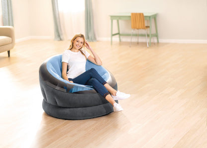 Large round beanbag chair with dark gray outer and light blue inner cushion