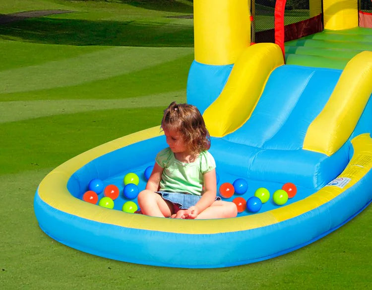 Inflatable pool and slide set with blue basin, yellow slide, and colorful balls