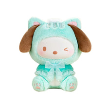 Mint-blue plush character toy with brown ears and a ribbon bow, seated.