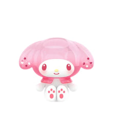 Pink mini character figure with bubble cap and paw-print outfit, collectible toy