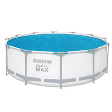 Blue round solar pool cover with elastic straps on steel pool