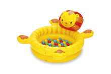 Inflatable yellow ball pit with lion face and colorful plastic balls inside