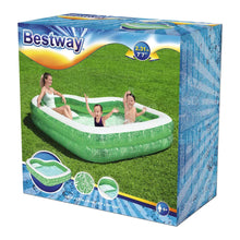 Inflatable round pool with green tropical leaf print and white rim, in box