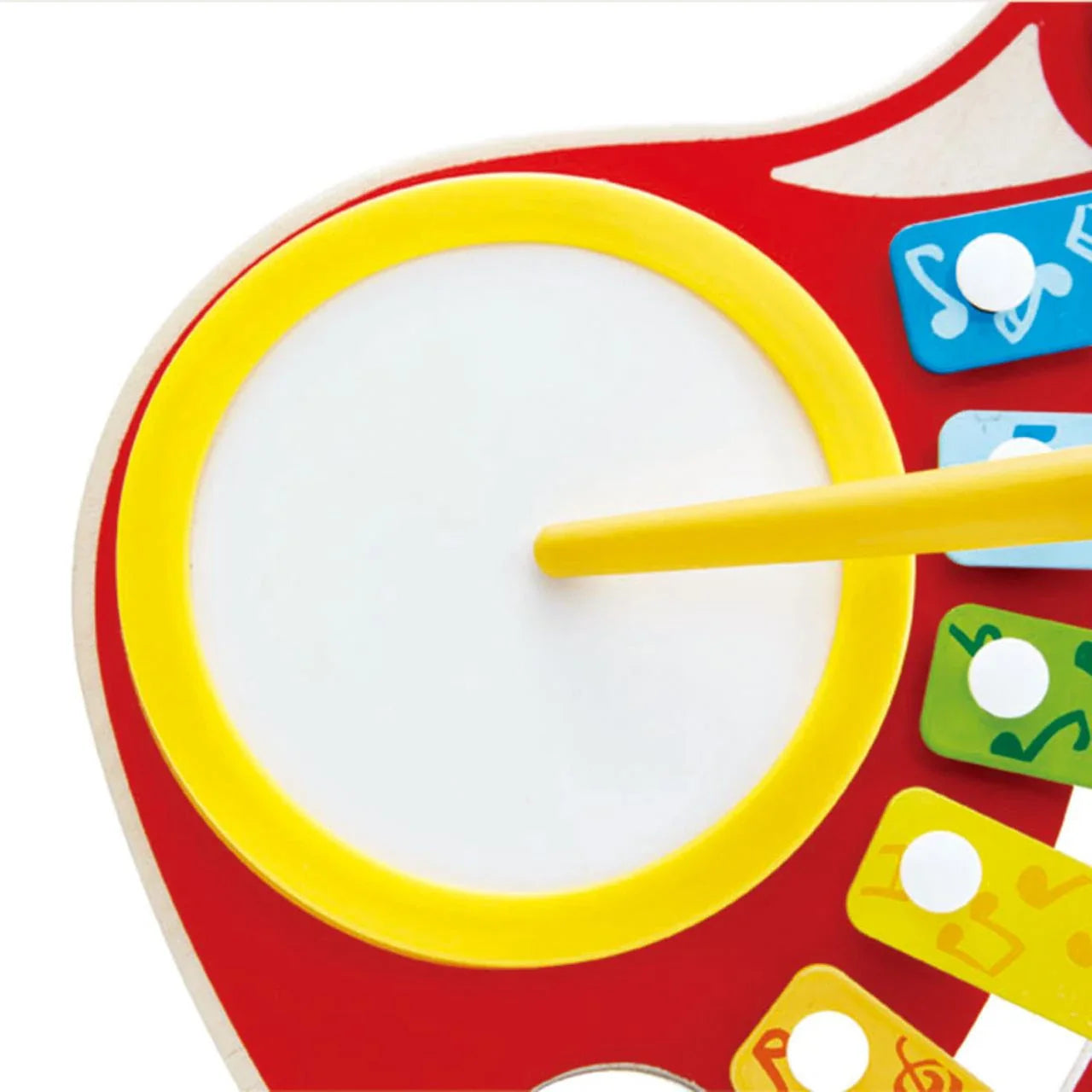 6-IN-1 Music Maker close-up: yellow-ring drum and wooden mallet on red guitar