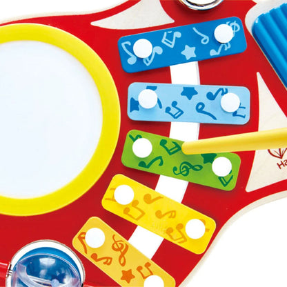 6-IN-1 Music Maker close-up: colorful xylophone bars with note icons and white knobs