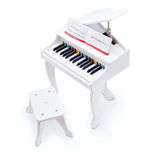 White deluxe grand piano with open lid and colorful note stickers on music panel