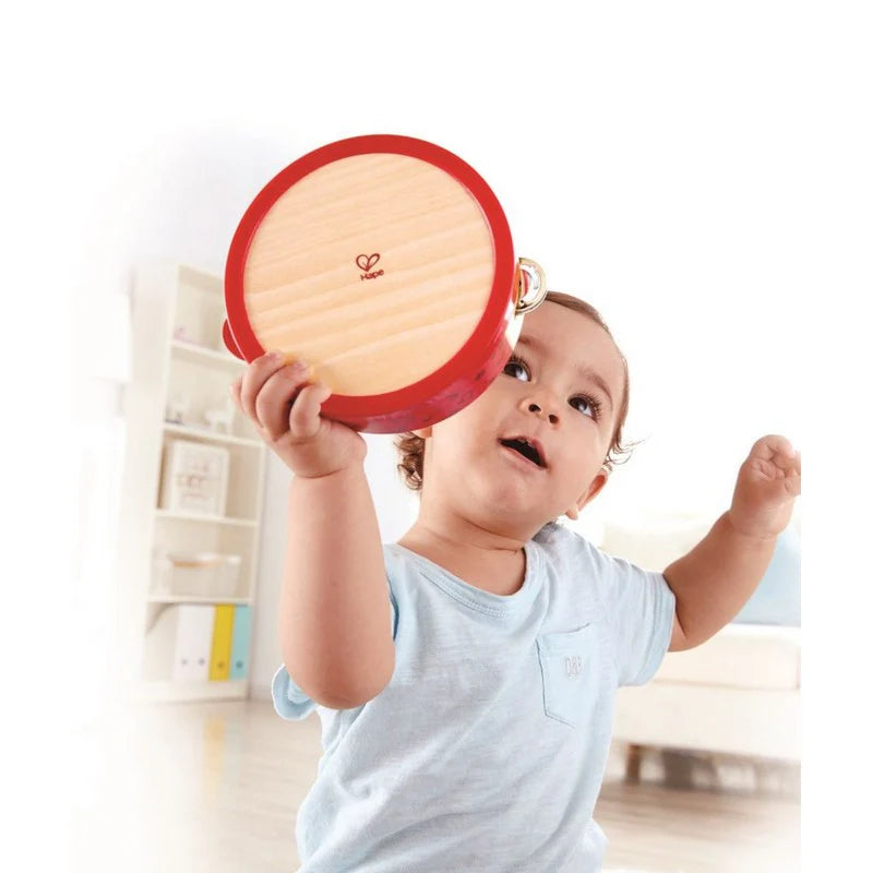 TAP-ALONG TAMBOURINE: rote Rahmentrommel mit runder Holzplatte und Metallringen