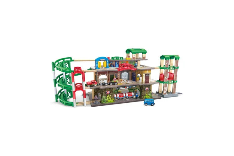 Multi-level railway city set with green and red tracks and station buildings