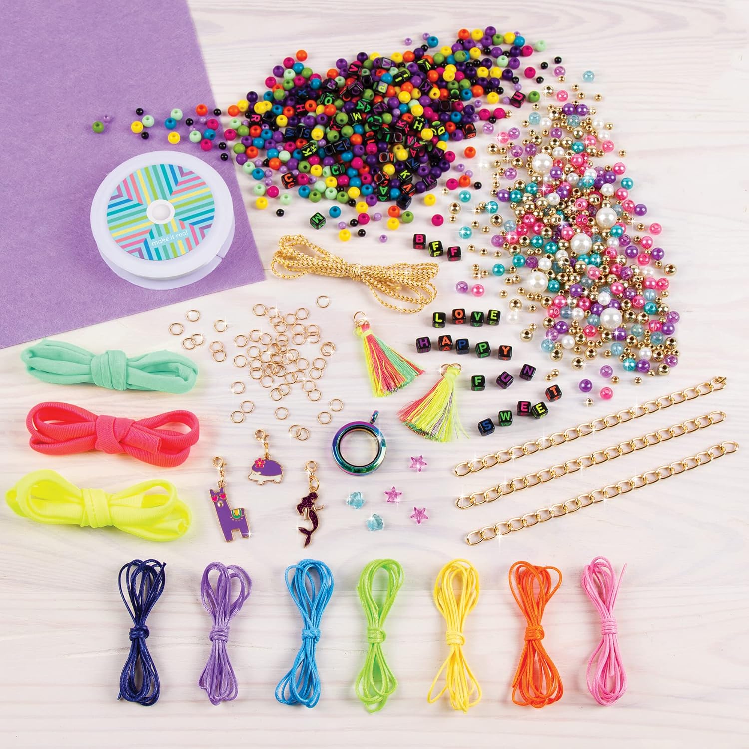 Colorful bead and charm pieces, rings, tassels, cords, and chain links