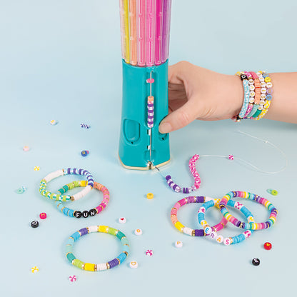 Bead bracelet making with teal clicker; colorful finished bracelets on wrist