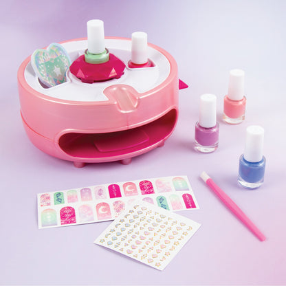 Pink nail dryer with bottles and sticker sheets for decorating nails