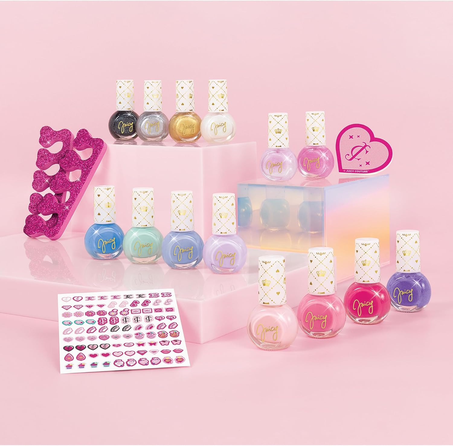 Nail polish design set with bottles, heart glitter separators, and nail sticker sheet
