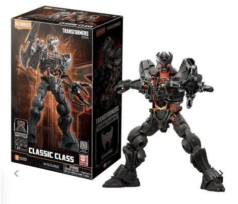 Transformers Scourge CC3 figure in box, dark gray armored robot with orange accents