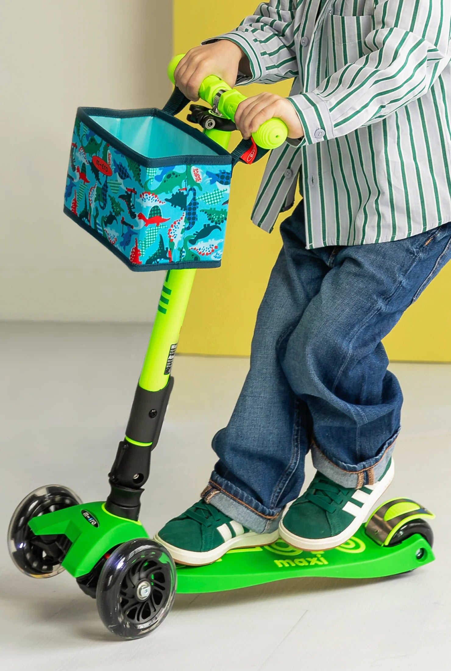 Foldable LED scooter in lime green with three wheels and black front wheel housing
