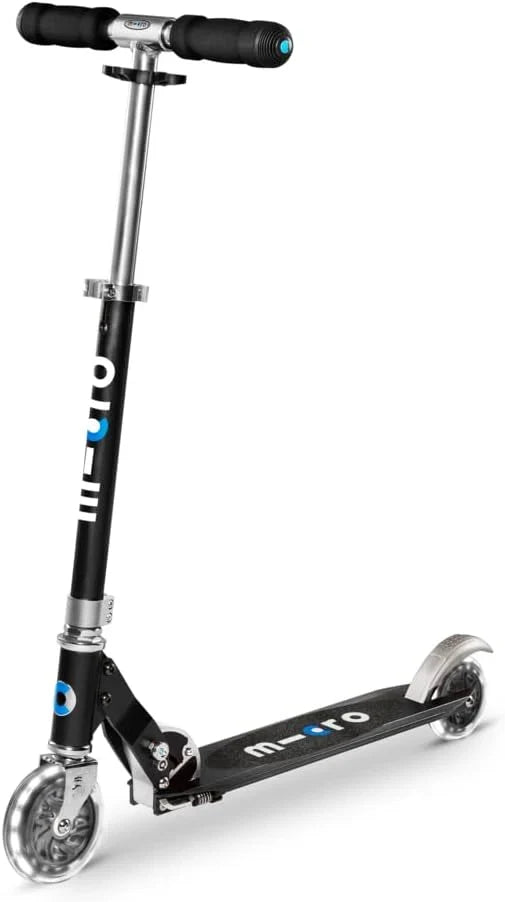 Black LED kick scooter close-up of handlebar, wheels, and m-cro deck