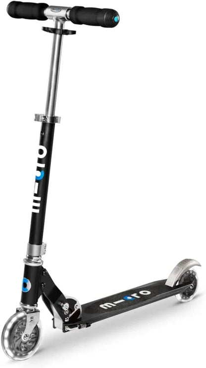 Black LED kick scooter close-up of handlebar, wheels, and m-cro deck