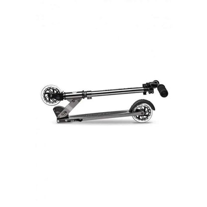 Black LED scooter side view with long frame, two wheels, and rear deck