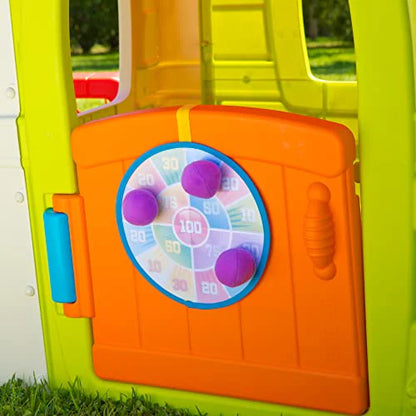 Orange activity panel with purple dial on a green-and-white kids playhouse