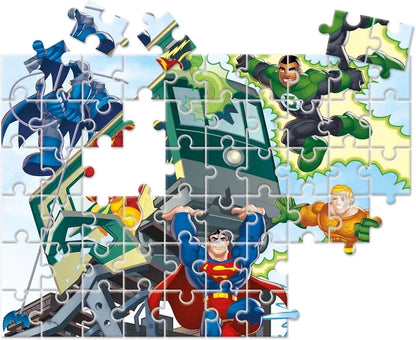 Superhero jigsaw puzzle with loose pieces forming a scene
