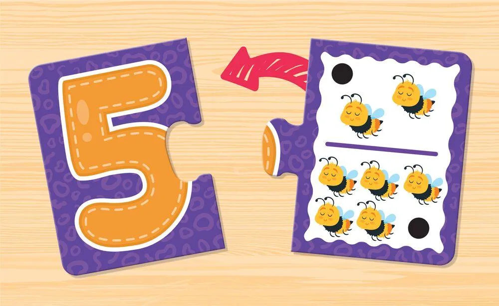 Purple and orange foam puzzle pieces forming number 5 with chick illustrations