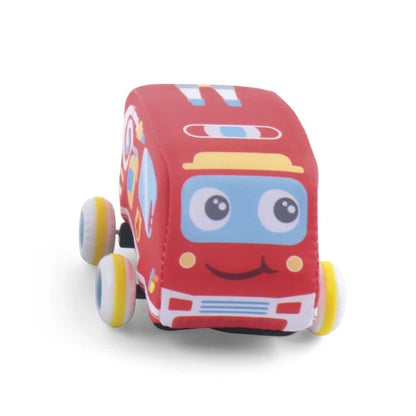 Soft fabric friction car with red face, friendly smile, and yellow wheels.